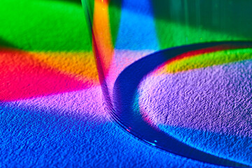 Colorful Light Refraction Spectrum on Textured Surface - Macro View