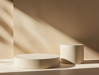 two empty pedestals on a beige background
