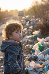 A saddened child observing the environmental impact of plastic waste