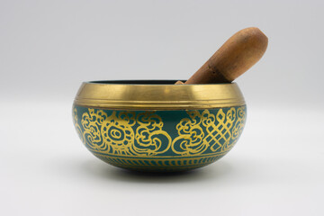 Close up of a tibetan singing bowl on a white background
