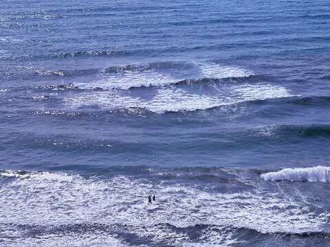 Stormy sea waves on the beach.