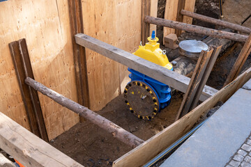 City street infrastructure maintenance, with a replacement of water and gas systems. This urban development project involves repairing pipes and upgrading the city's infrastructure.