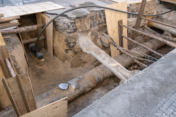 City street infrastructure maintenance, with a replacement of water and gas systems. This urban development project involves repairing pipes and upgrading the city's infrastructure.