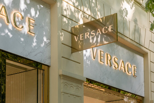 Prague, CZ -16.4.2024: Versace sign  logo above the entrance to a boutique store in Prague, a luxury brand welcoming visitors with its elegant design. Editorial