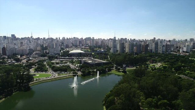 Aerial view of Ibirapuera Park - Parque Ibirapuera, Sao Paulo, Brazil. Landmark avenue and buildings of city. Ibirapuera lake. This image is perfect for projects related to events, travel and tourism.
