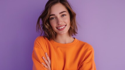 Fototapeta premium A Smiling Woman in Orange Sweatshirt