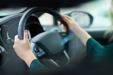 Hands, travel and driving car with steering wheel for vacation, holiday or trip in motor vehicle. Closeup, dashboard and person in transport on journey for adventure, commute or speed in automobile