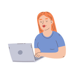 Redhead girl typing on a laptop