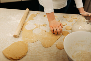 Woman Making Cookies on a Table
