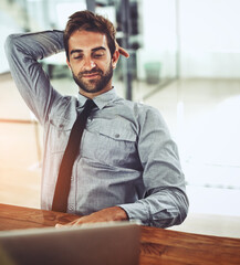 Naklejka premium Relax, thinking and man in office with laptop, smile and planning online project for business ideas. Calm, ideas and happy businessman at desk with computer, research and problem solving in workplace