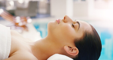 Spa, salon and woman relax at pool for massage, facial treatment and luxury pamper. Aesthetic,...