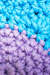 crochet stitches in blue and purple yarn