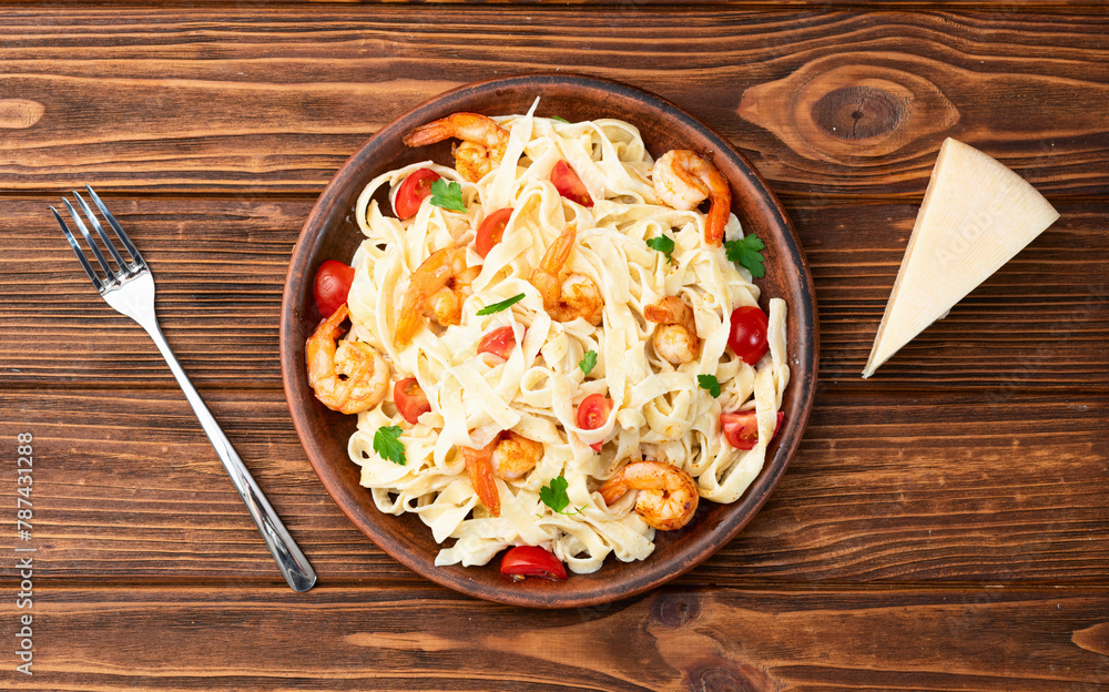 Canvas Prints italian pasta with shrimps , parmesan and tomatoes