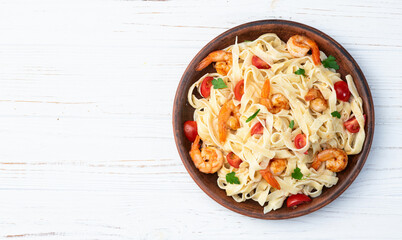 Italian pasta with shrimps , parmesan and tomatoes