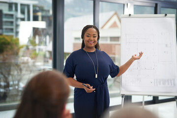 Architecture, woman and blueprint in presentation with discussion, training or meeting on building project. Black person, developer or happy with floor plan or strategy for house remodeling in office