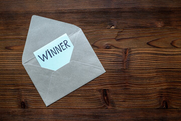 Congratulatory letter for the winner on letter envelope. Winner concept.
