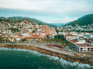 Far view over ocean of our Lady of Guadalupe church in Puerto Vallarta, Jalisco, Mexico at sunset.