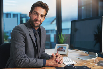 Portrait, happy and business with man at desk, professional and stock market with computer and...