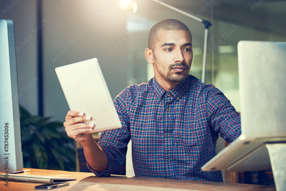 Poster laptop, serious and business man reading email, research or information on tablet at night in startu