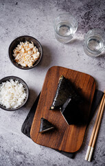 Yaki onigiri, Japanese triangular rice balls stuffed with tuna and spice sauce - 787467253