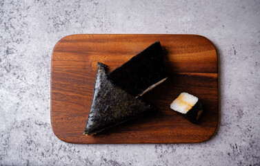 Yaki onigiri, Japanese triangular rice balls stuffed with tuna and spice sauce - 787467263