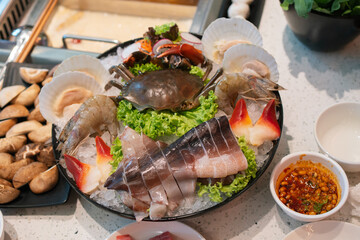 Raw seafood platter for steamboat