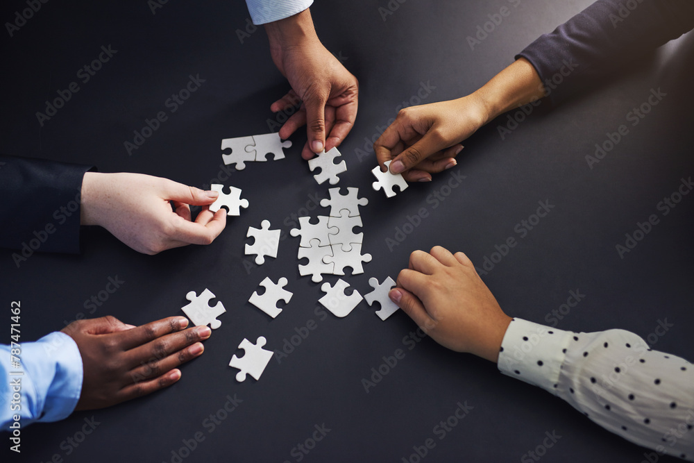 Poster hands, puzzle and business people with teamwork, planning and brainstorming for project or cooperati