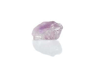 Amethyst mineral stone macro on white background
