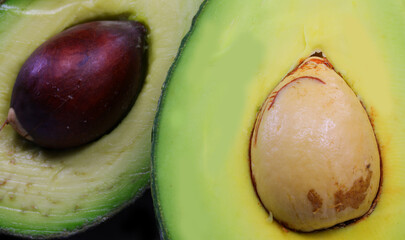 green avocados halved with large seed ideal for making guacamole sauce