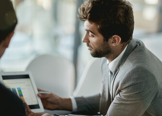 Fototapeta premium Business, men and office with graphs on tablet for performance or financial analysis and investment review. Male employees, communication and digital technology for online infographic and statistics.