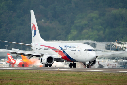 PENANG, MALAYSIA - MARCH 04, 2024: Blurred image of a Malaysia Airlines aircraft has just landed at the airport.