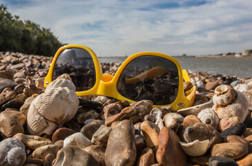 sunglasses on a sunny beach