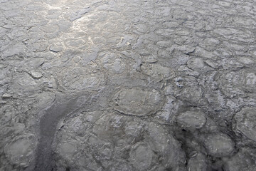 the frozen surface of the river in the winter season