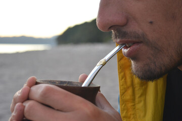 brown hair male person, in the mountains having a mate on vacation