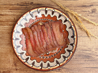 Pastrami slices, dried pork meat with herbs 