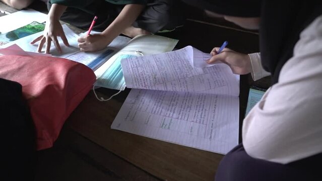 people studying together in rural area