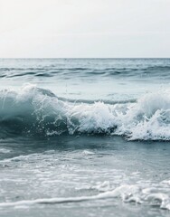 Fototapeta premium Person Standing on Beach Holding Surfboard