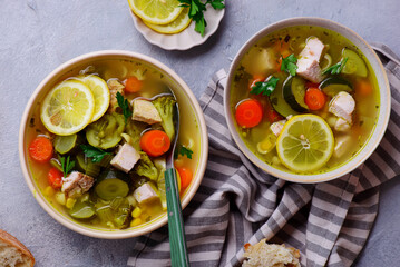 Vegetable soup with baked chicken and lemon .top veiw .style hugge - 787497492