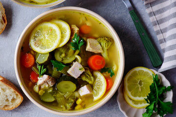 Vegetable soup with baked chicken and lemon .top veiw .style hugge - 787498022
