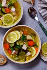 Vegetable soup with baked chicken and lemon .top veiw .style hugge - 787498663