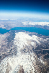 Obraz premium Beautiful earth and sea from a window airplane background