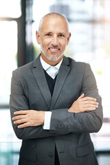 Office, smile and portrait of mature man with arms crossed, pride and support in business opportunity. CEO, entrepreneur or happy businessman with confidence, project management and company boss.