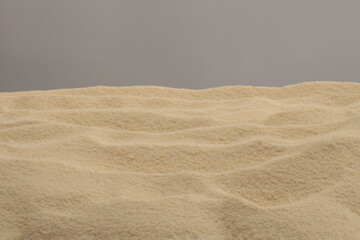 Fototapeta premium Wave beige sand background. Minimal empty display product presentation scene.