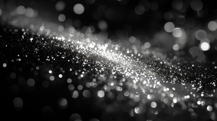Background with bokeh effect, black and silver highlights in the form of a cosmic galaxy