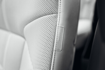 Close up view of modern car leather seat at the luxury interior