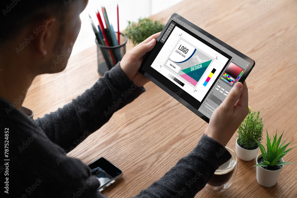 Aufkleber graphic designer software for modern design of web page and commercial ads showing on the computer s