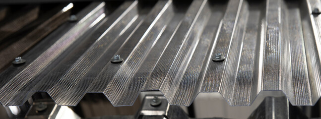 Transparent PVC corrugated roof sheet close up © Sergey