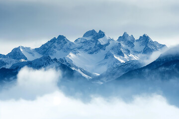Snow-capped peaks rise majestically through a blanket of clouds, creating an ethereal mountain landscape wrapped in mist.
