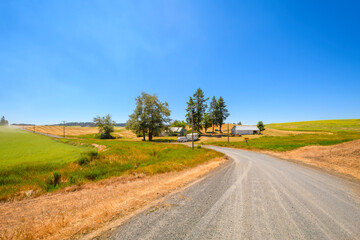 Fototapeta na wymiar A small roadside farm and ranch with home in Rockford, Washington, part of the rural Palouse area of Eastern Washington near Spokane Washington, USA.