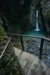 Caporetto, Slovenia. Kozjak waterfalls. Nature trail along the river with crystal clear, turquoise...